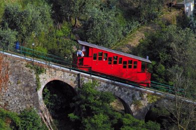Funicular crossing a stone bridge going up to Montecatini Alto